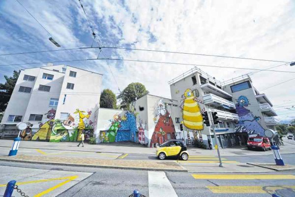 Graffiti Auftrag Zürich / Häuser Rötelstrasse 